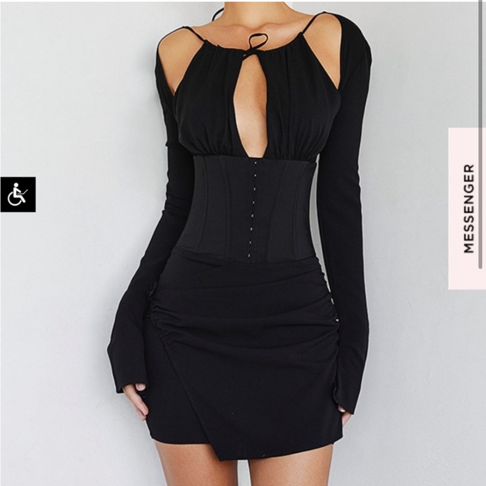 COPY - Mistress rocks: 'BEGINNINGS'
Black Wrap Front Dress
